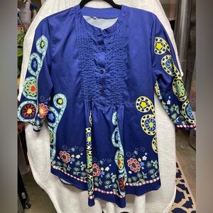 Embroidered tunic, flirty and fun!